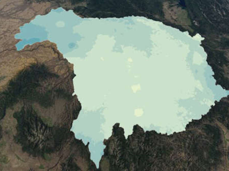 Aerial view of a map of the northwest United States with a large patch of various colors of blue covering northern Idaho