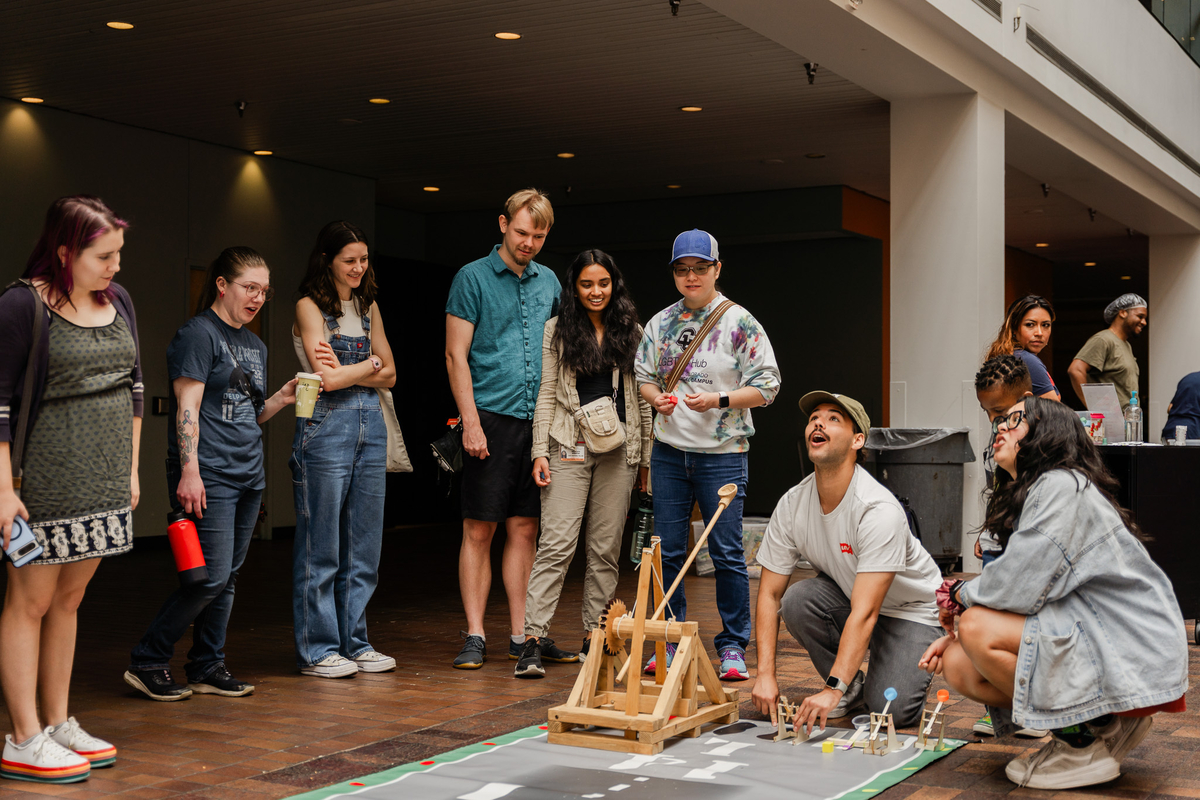Guests engaging with activity at museum