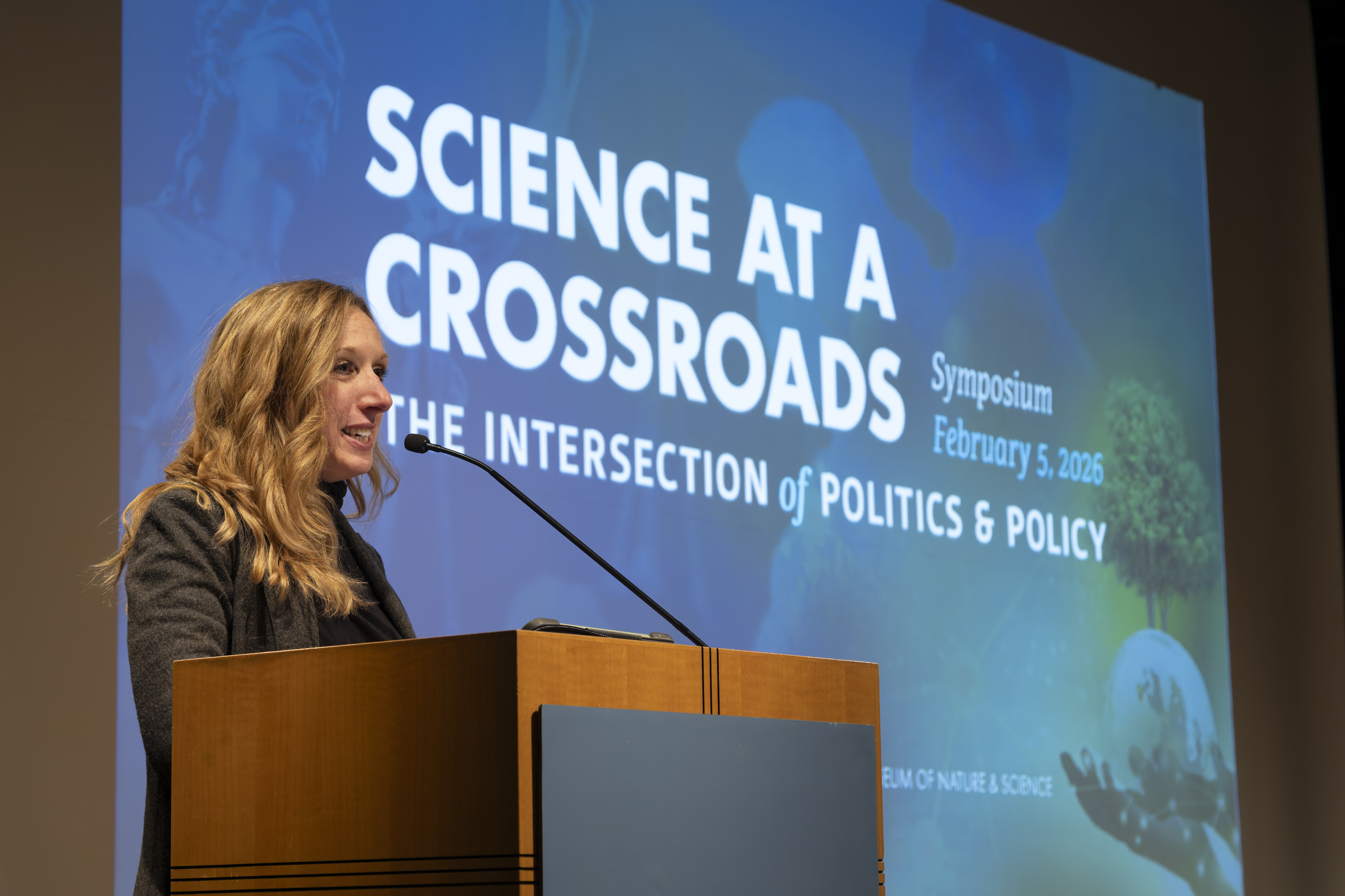 Institute for Science & Policy Executive Director Kristan Uhlenbrock welcomes everyone to the 2026 Symposium. (Photo/Rick Wicker)