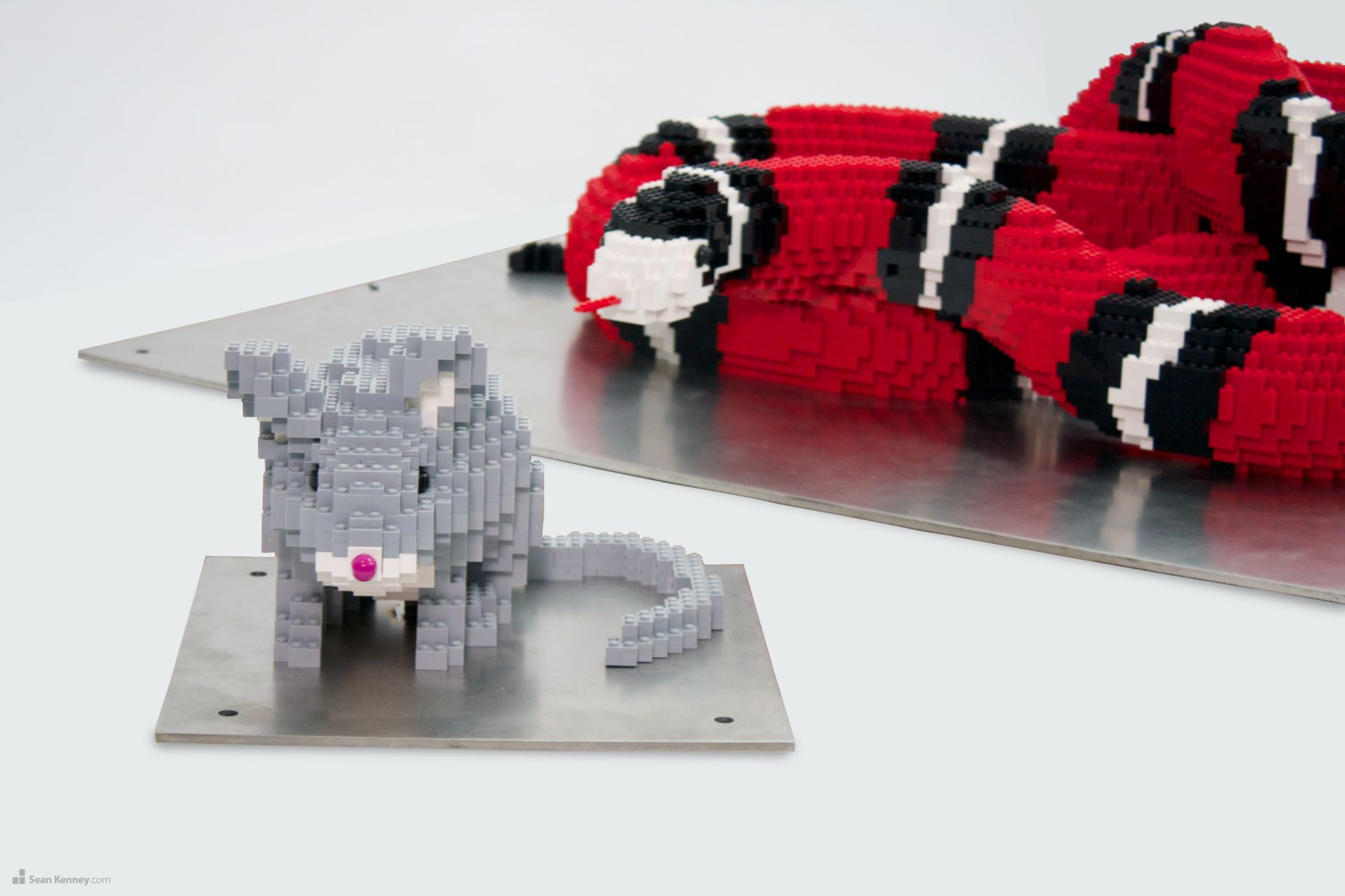 Snake and mouse sculptures