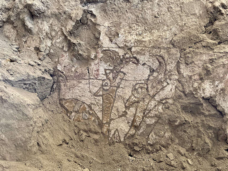 Excavation of a painted wall at Pañamarca
