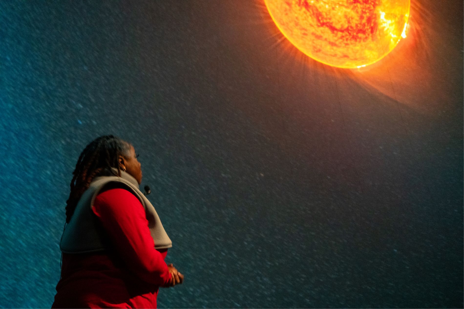 Educator Performer Kenya Fashaw performs as Jesse in the Destination Solar System show in the Gates Planetarium. (Photo/ Kelsi Cowan)