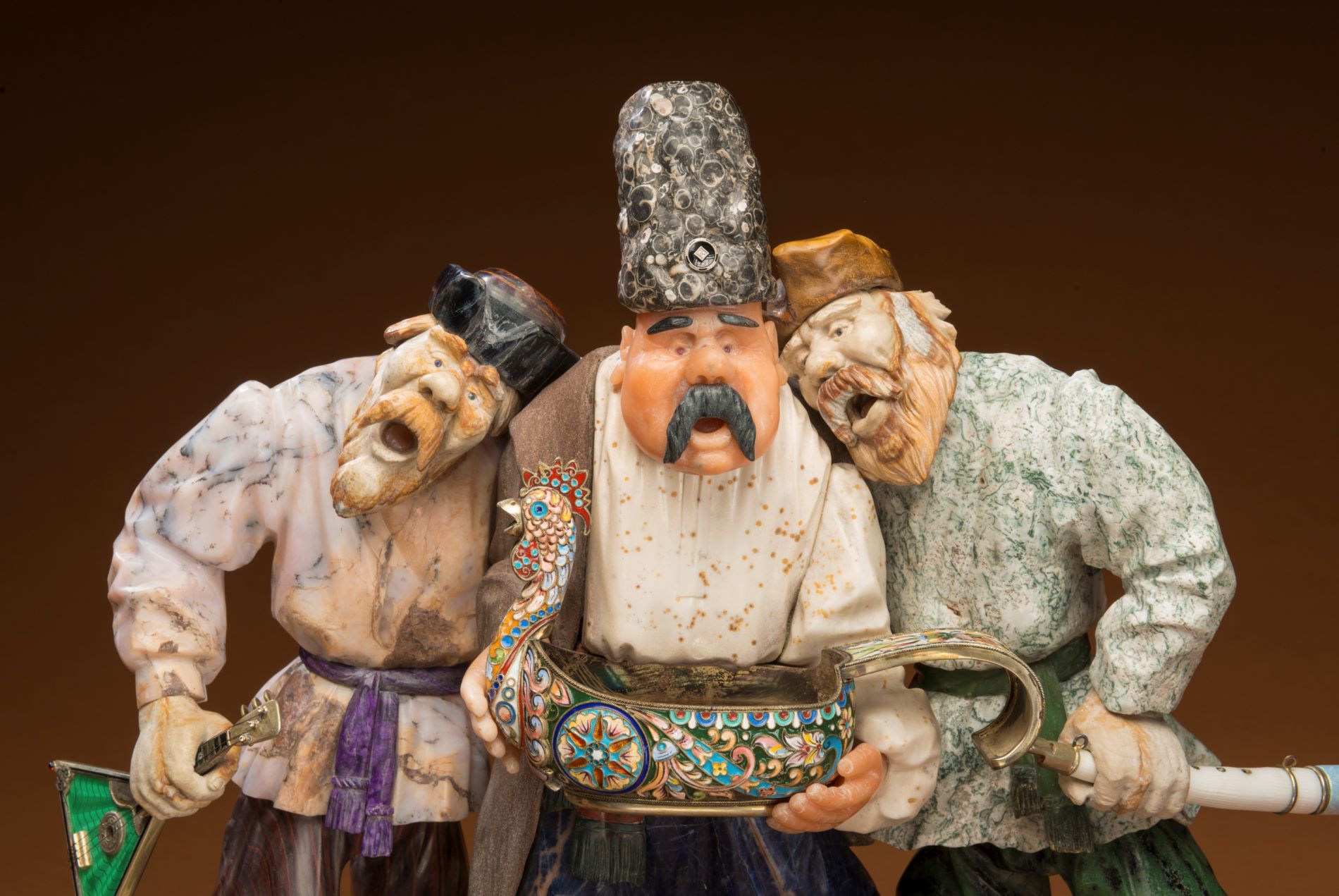 “Bosom Pals," on display at the Denver Museum of Nature & Science, is a vibrant depiction of three men immersed in the throes of song and merriment. (Photo/ Rick Wicker)