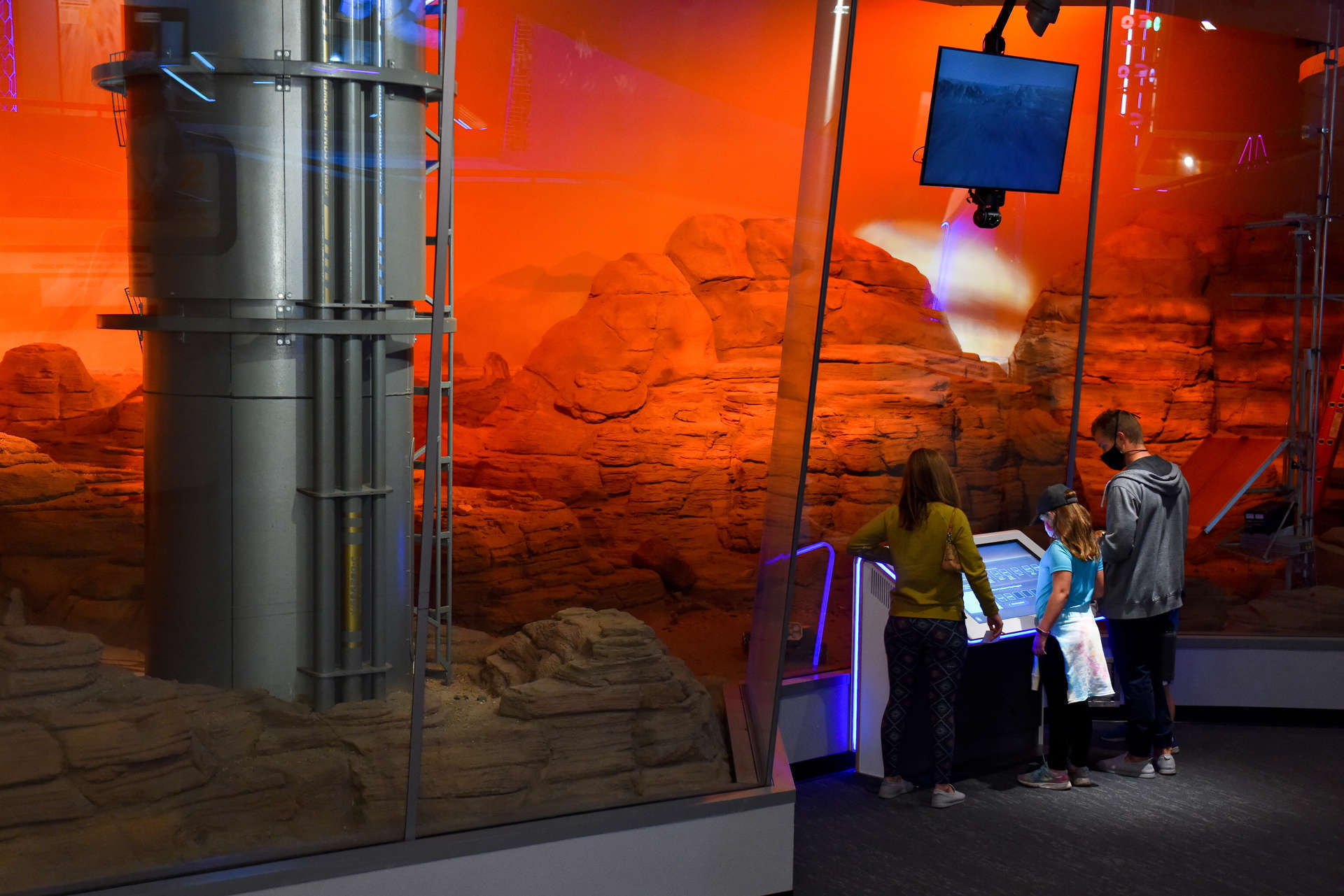 Visitors exploring the Mars Outpost inside Space Odyssey at the Denver Museum of Nature & Science.